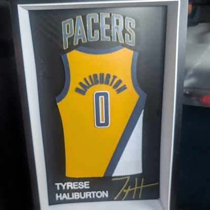 3D printed framed basketball jersey display in team colors