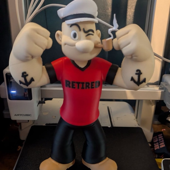 3D printed cartoon sailor figure wearing a red RETIRED shirt, made as a retirement gift