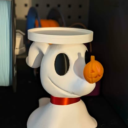 3D printed ghost dog figure with a pumpkin nose